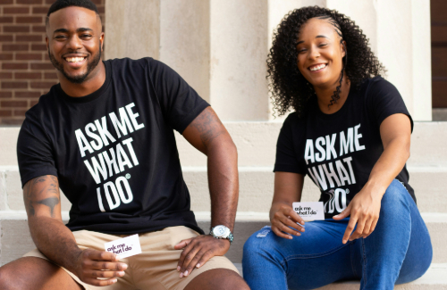 picture of a man and a woman who are wearing shirts that say 