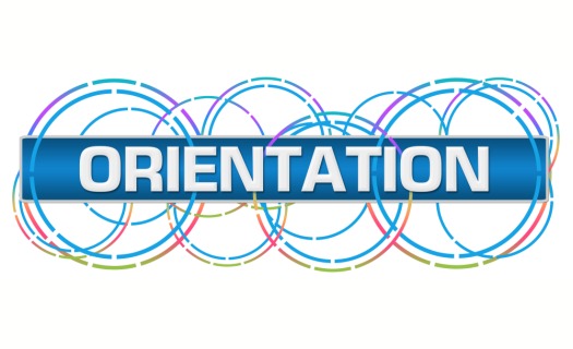 The word ORIENTATION on a blue banner over a few layers of multicolored circles. 