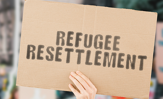 phrase-refugee-resettlement-on-banner-mens
