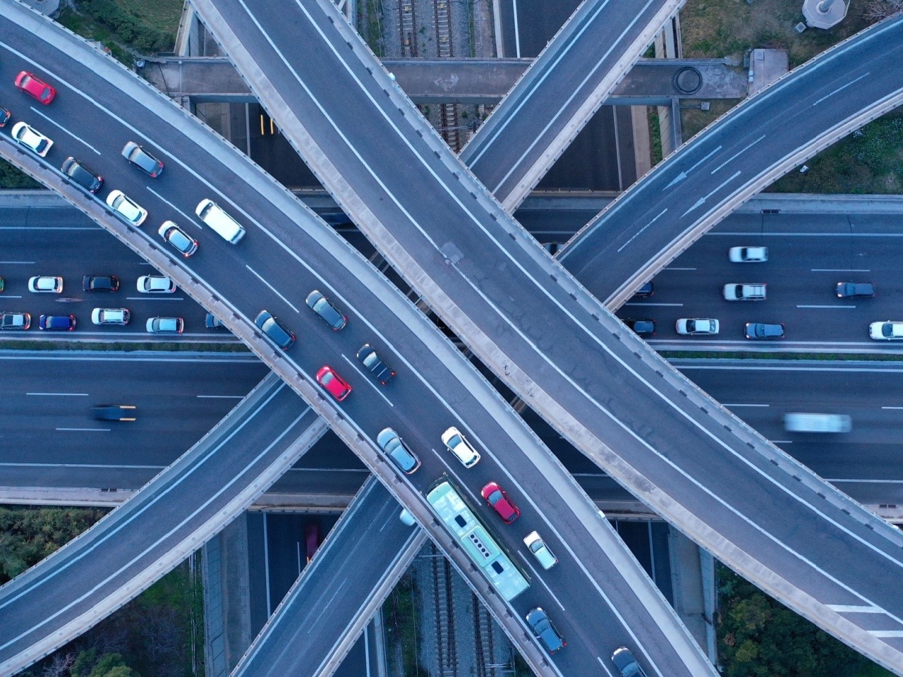 Overhead view of intersecting highways with cars